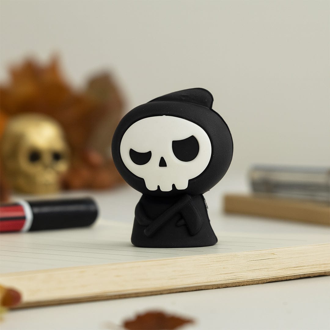 Halloween-themed eraser set.