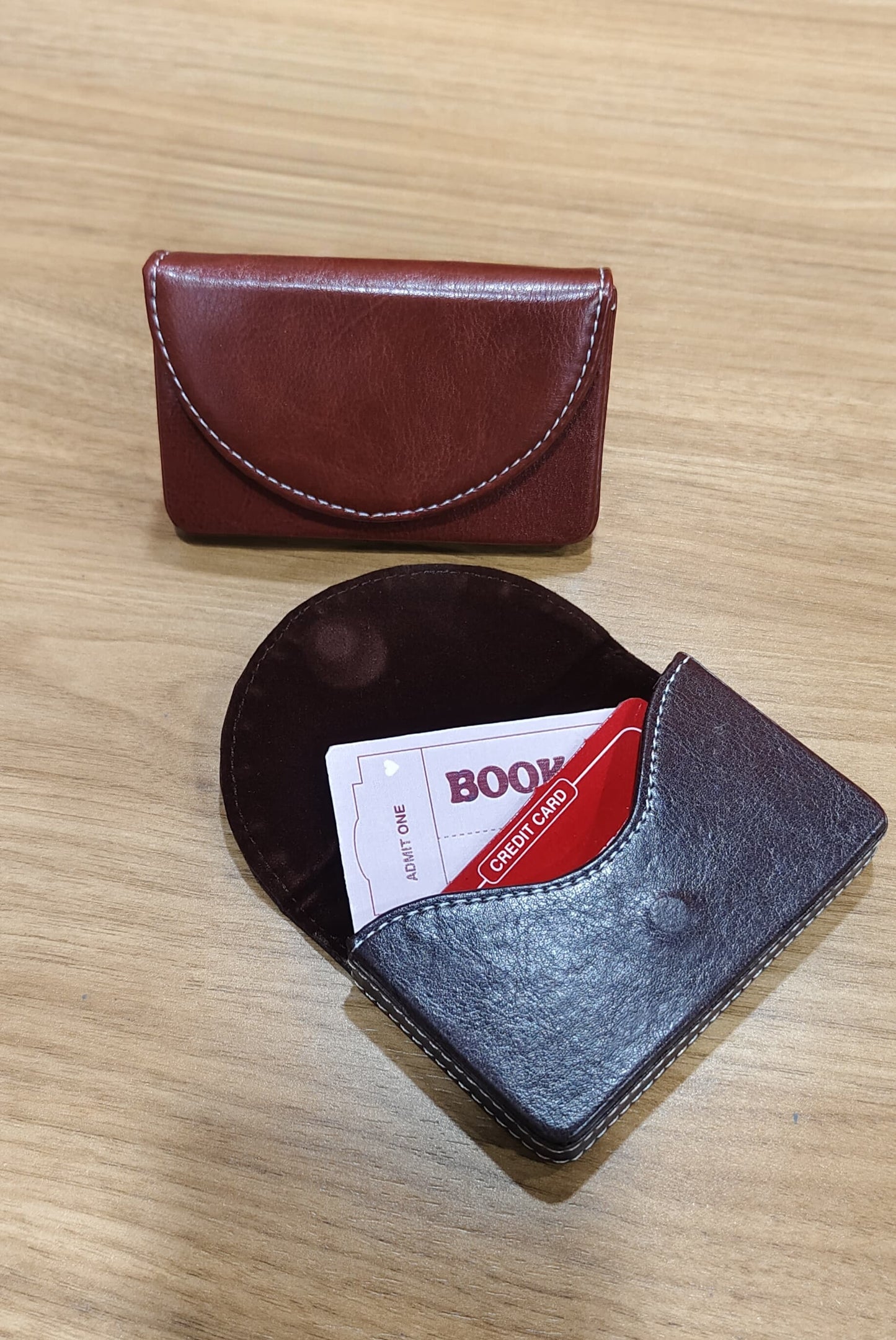 Leather look card holder .